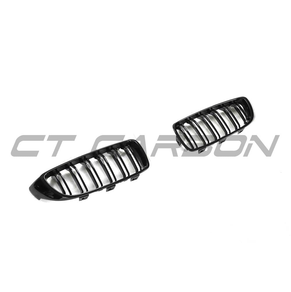 BMW M3 F80 double slat black grille by CT Carbon, showcasing sleek black carbon fiber design for sporty styling.