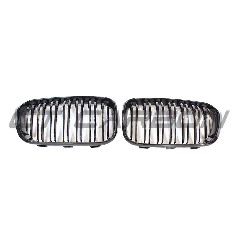 BMW F20 1 Series LCI double slat gloss black grille by CT Carbon, showcasing sleek, high-quality automotive grille design.