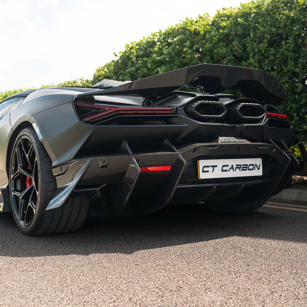 Lamborghini Revueltto carbon fibre rear diffuser by CT Carbon, showcasing sleek design and aerodynamic features.