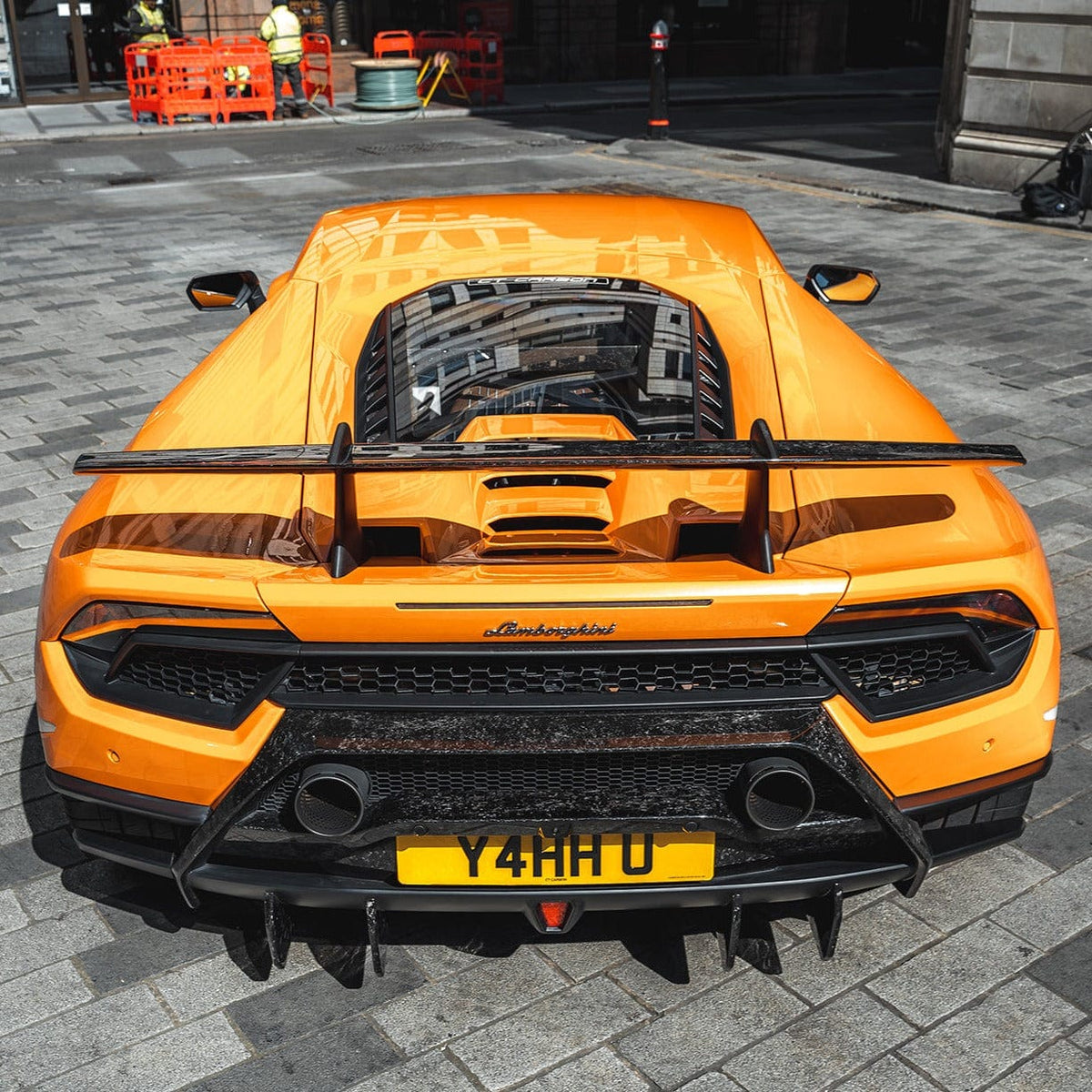 Lamborghini Huracan Performante diffuser extensions by CT Design, showcasing carbon fiber details on a sleek diffuser.