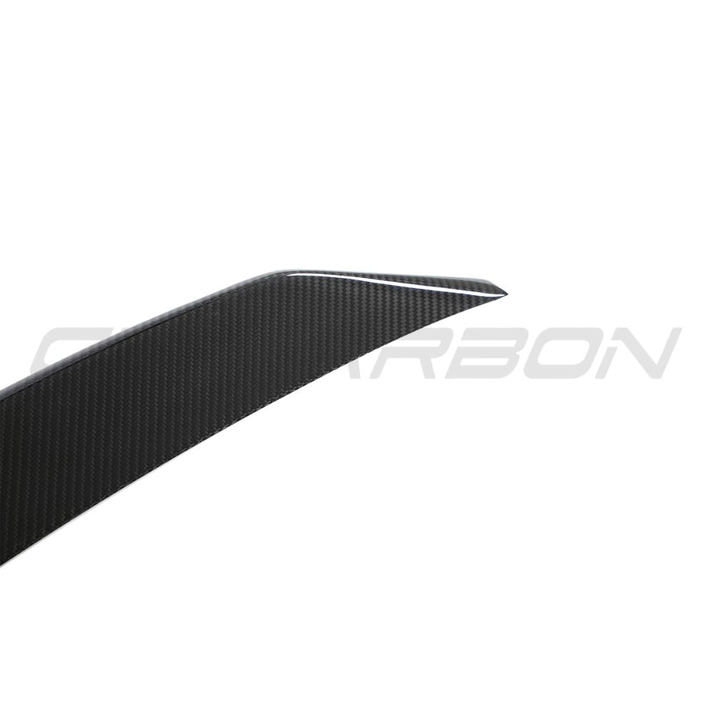 Lamborghini Urus carbon fibre boot spoiler by CT Design, showcasing sleek aerodynamic design and glossy finish.