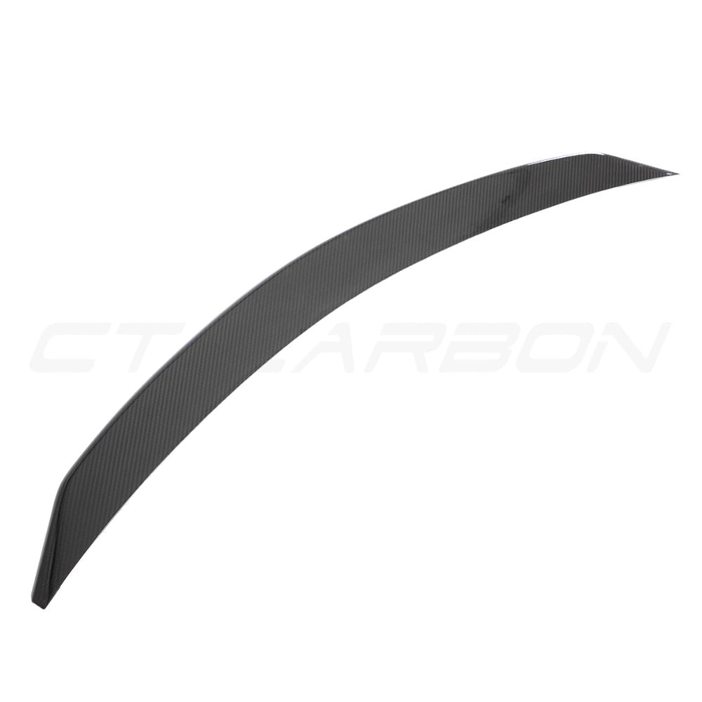 Lamborghini Urus carbon fibre boot spoiler by CT Design, showcasing sleek, aerodynamic design on a luxury SUV.