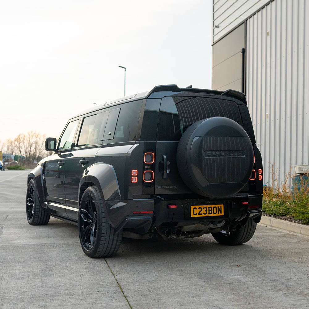 Land Rover Defender L663 110 full carbon fibre wide arch kit by CT Carbon, showcasing sleek, lightweight carbon fibre fender extensions.