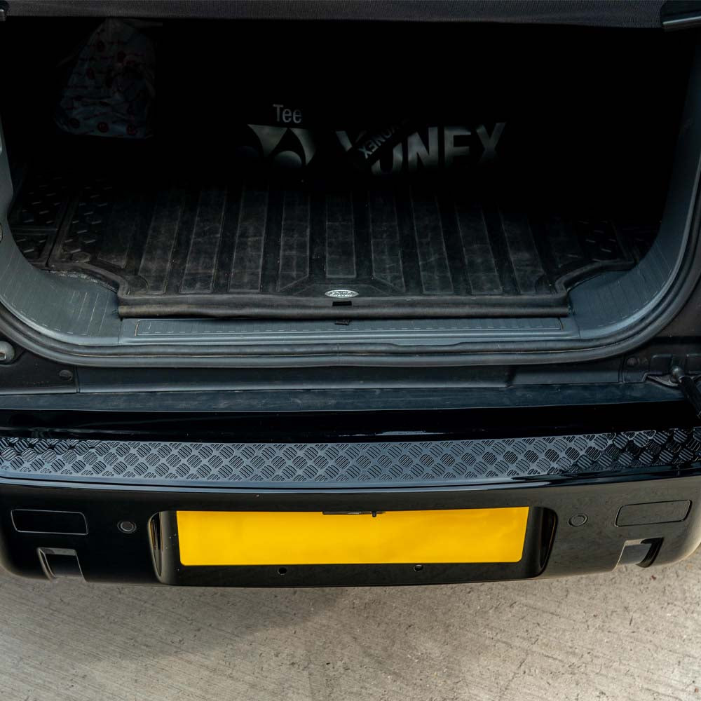 Land Rover Defender L663 110 gloss black anti-scratch trim set by CT Carbon, shown installed on vehicle with close-up details.