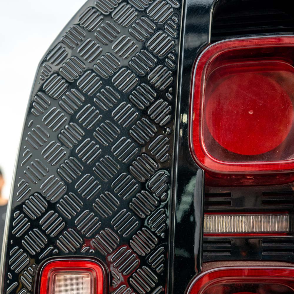 CT Carbon gloss black anti-scratch trim set for Land Rover Defender L663 110, includes sleek protective trim pieces.