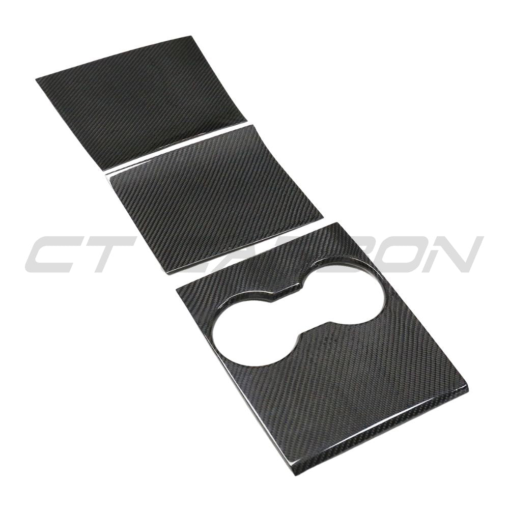 CT Carbon carbon fiber center console add-on for Tesla Model 3 2017-2023, shown installed in the vehicle interior.