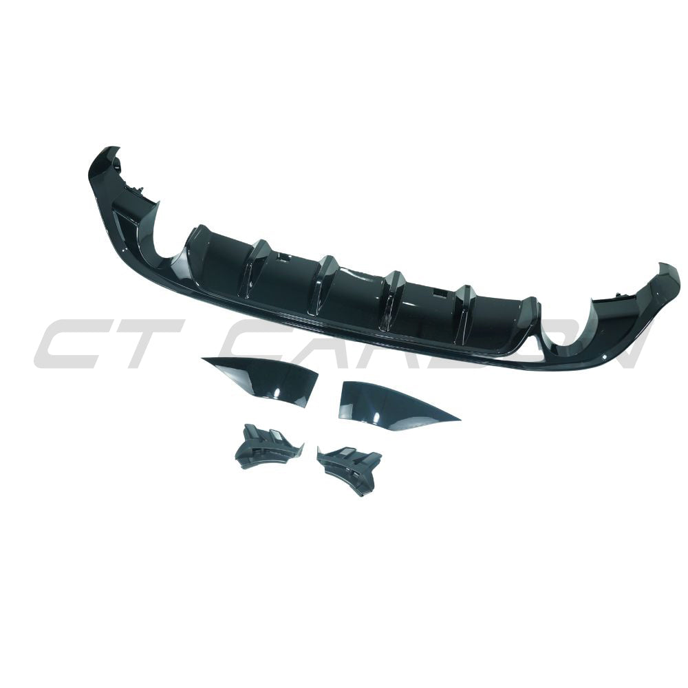 Gloss black diffuser for Volkswagen Golf GTI/GTD MK7/7.5 2017-2020 by CT Carbon, showcasing sleek aerodynamic design.