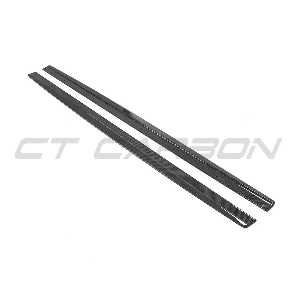 Carbon fibre side skirts for Audi RS6 C7/C7.5 2013-2018 by CT Carbon, showing sleek aerodynamic design and textured finish.