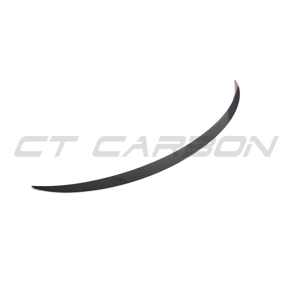 Tesla Model 3 Facelift 2023+ carbon fiber spoiler by CT Carbon, showing the sleek, aerodynamic rear spoiler on the car.