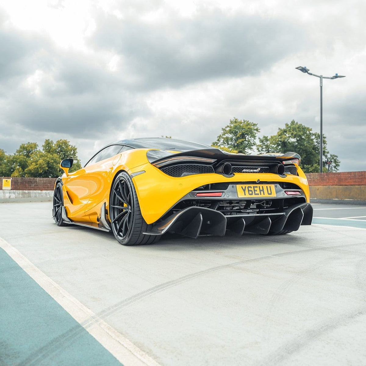 CT Carbon McLaren 720S carbon fiber diffuser, sleek aerodynamic component with detailed weave pattern and precise fit for performance.