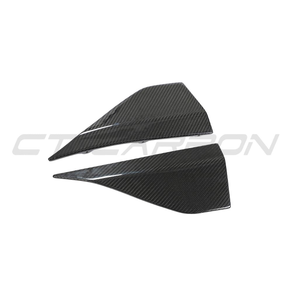 MCLAREN 720S carbon fiber splitter by CT Design, close-up view showing sleek aerodynamic design and textured carbon fiber material.