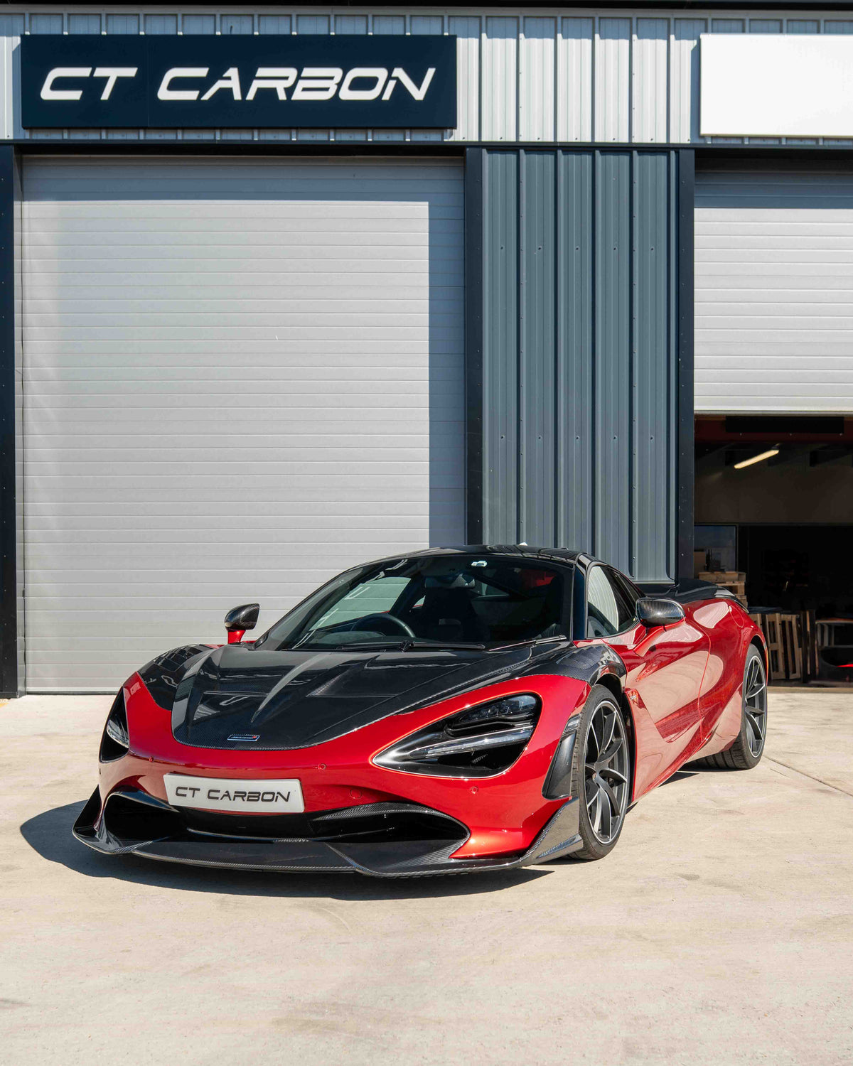 Carbon fiber splitter for McLaren 720S by CT Design V2, showcasing sleek aerodynamic splitters on a high-performance sports car.