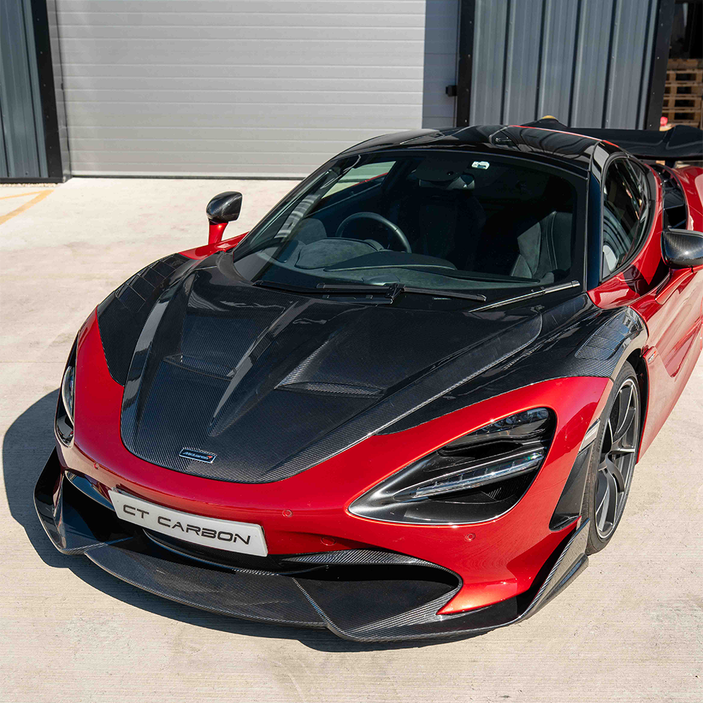 Carbon fiber splitter for McLaren 720S by CT Carbon, showcasing the aerodynamic design and lightweight construction.
