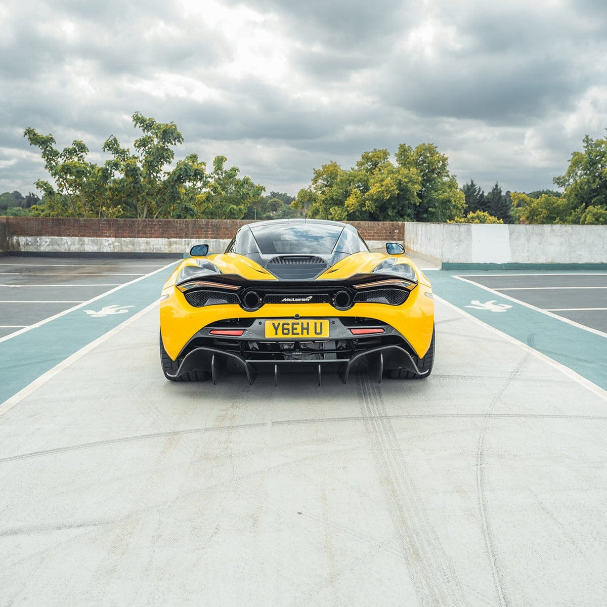 MCLAREN 720S full carbon body kit by CT Design V2, showcasing carbon fiber panels and aerodynamic design details.
