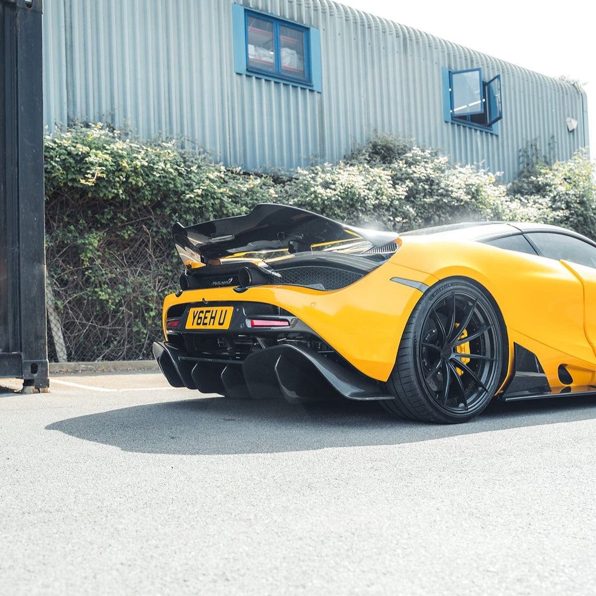 McLaren 720S full carbon kit by CT Design V2, featuring carbon fiber body panels on a sleek supercar.