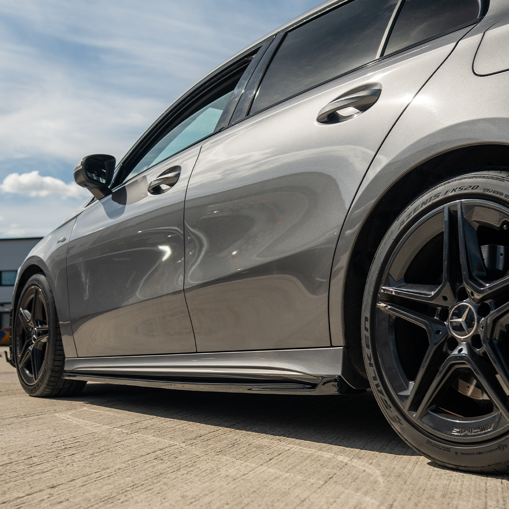 Mercedes A-Class W177 V177 2018+ side skirts in gloss black by CT Carbon, shown on the vehicle's side profile.