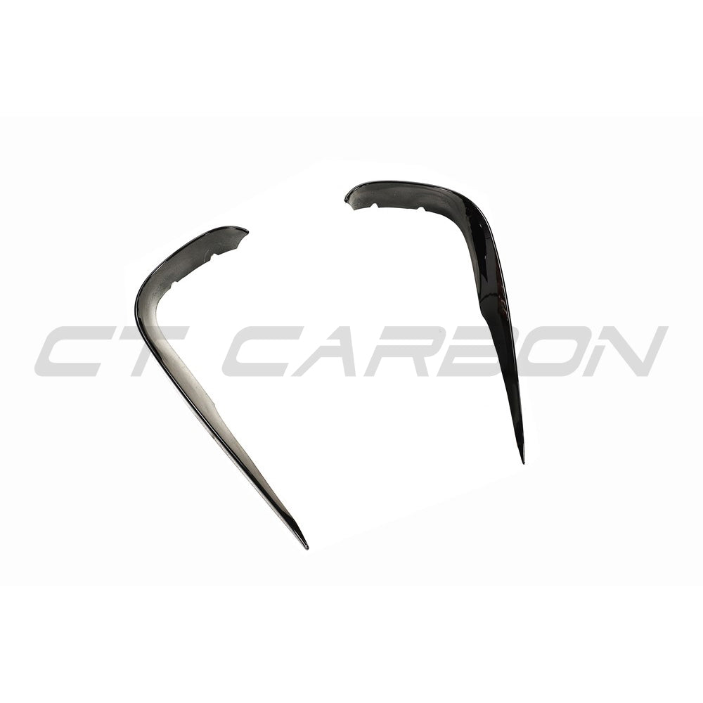 Mercedes C238 2017-2020 E-Class Coupe front bumper trim accessory by CT Carbon, close-up view of the sleek carbon fiber finish.