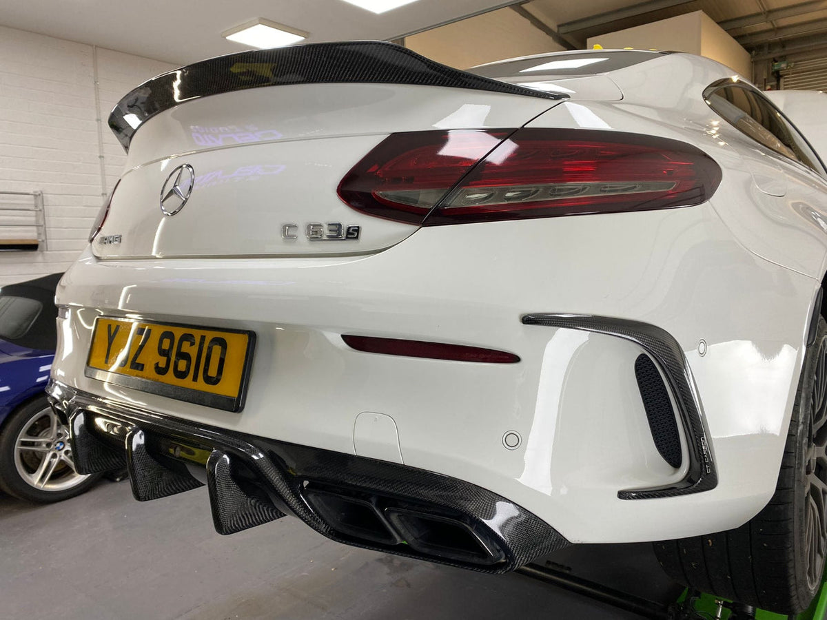Mercedes C63/C-Class W205 convertible carbon spoiler by CT Carbon, featuring sleek PS style design for sporty enhancement.