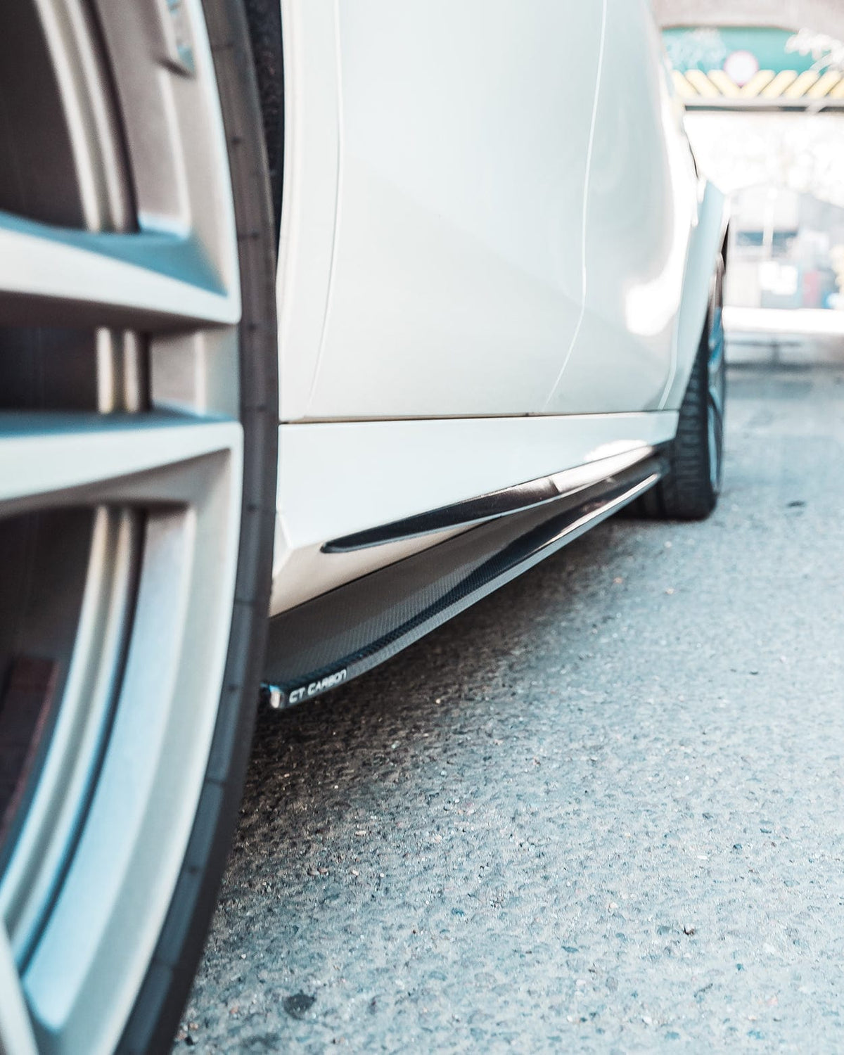 Mercedes E63 W213 2018-2020 CT Carbon full carbon fibre kit installed on the full car, showcasing sleek carbon fiber details.