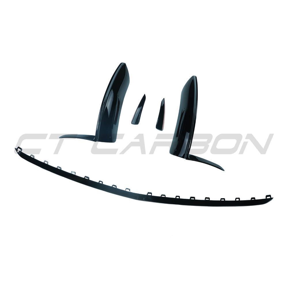 Mercedes V177 W177 A-Class 2023 gloss black splitter and canards by CT Carbon, close-up of front bumper accessories.