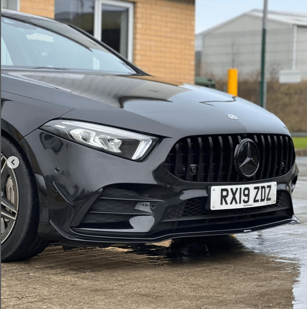Mercedes W177 2018-2022 A-Class CT Carbon gloss black kit installed on the vehicle, featuring sleek black exterior accents.
