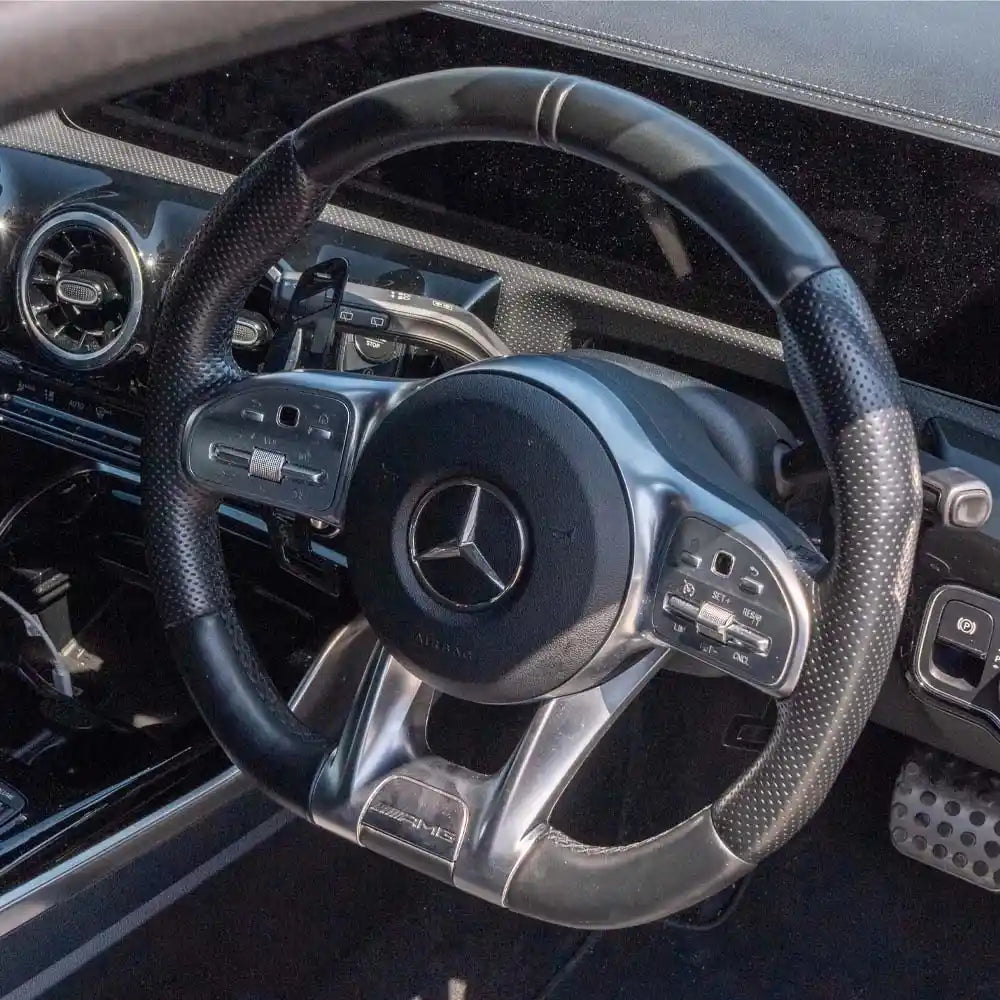 Mercedes AMG magnetic carbon fiber shifter paddles by CT Carbon, featuring sleek black carbon fiber design for luxury car interior.