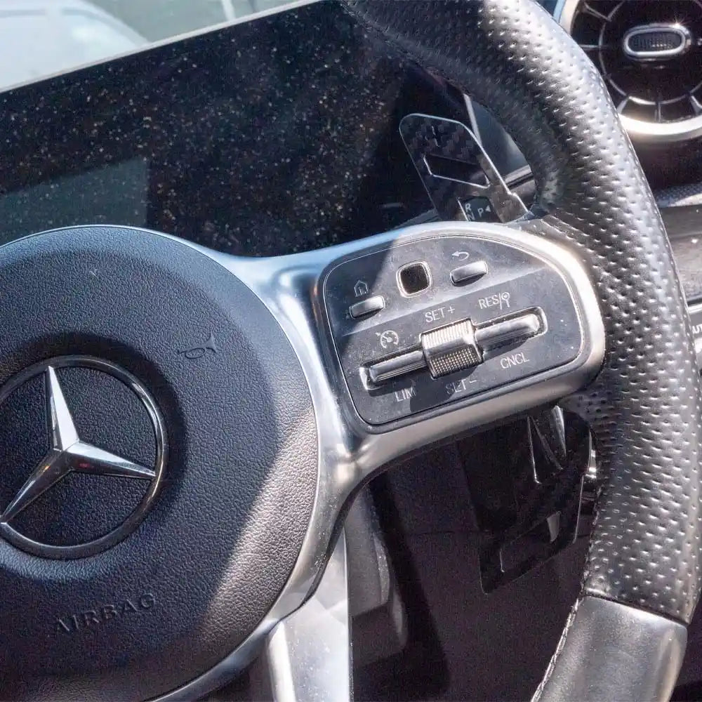 Mercedes AMG magnetic carbon fiber shifter paddles by CT Carbon, sleek automotive accessories for enhanced driving style.