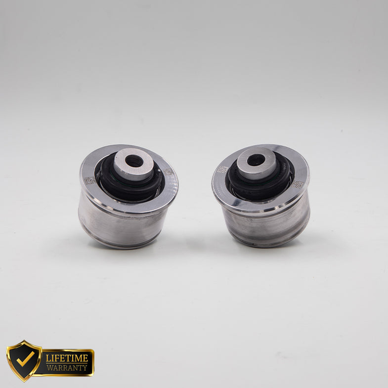 Suspension Secrets solid front control arm bushes for BMW G87 M2, close-up of suspension linkage components on a vehicle.