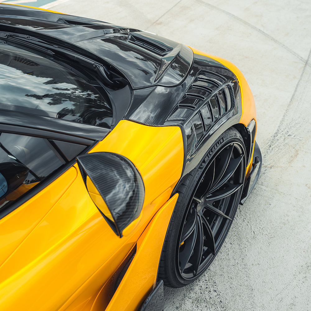 Carbon fiber front fenders for McLaren 720S by CT Design, showcasing sleek, lightweight performance-enhancing car parts.