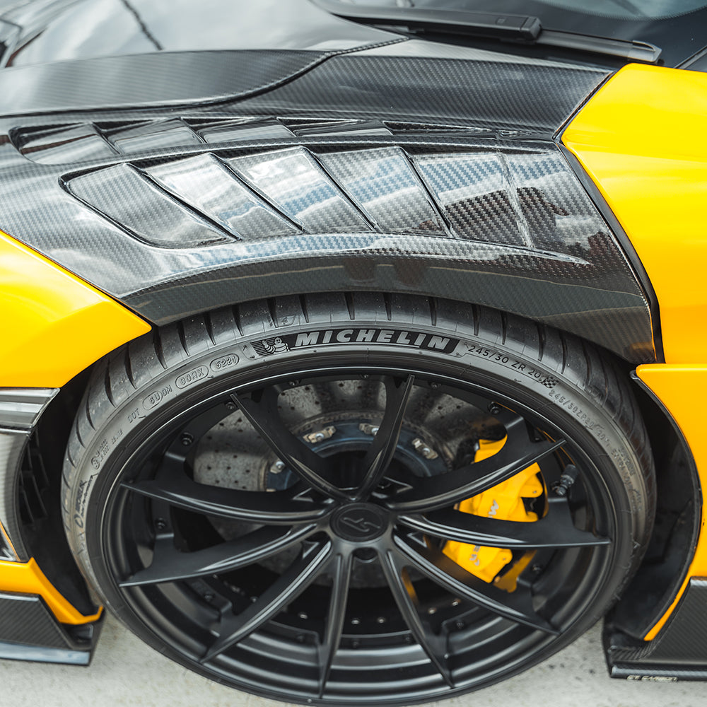 MCLAREN 720S carbon fibre front fenders by CT Design, showcasing lightweight, aerodynamic automotive parts on a sleek sports car.