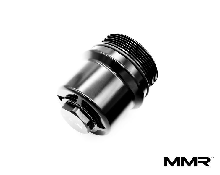 BMW B58 and B57 engine bay with MMX Performance oil filter housing head, showcasing durable metal construction and precise fit.