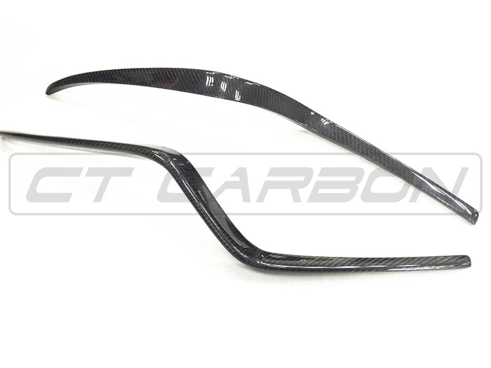 Carbon fiber front bumper trim for Porsche Macan 2014-2017 by CT Carbon, close-up view of sleek, lightweight accessory enhancement.