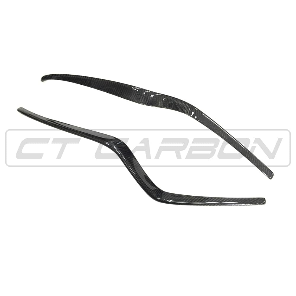 Carbon fiber front bumper trim for Porsche Macan 2014-2017 by CT Carbon, showing close-up of the sleek, textured accessory.