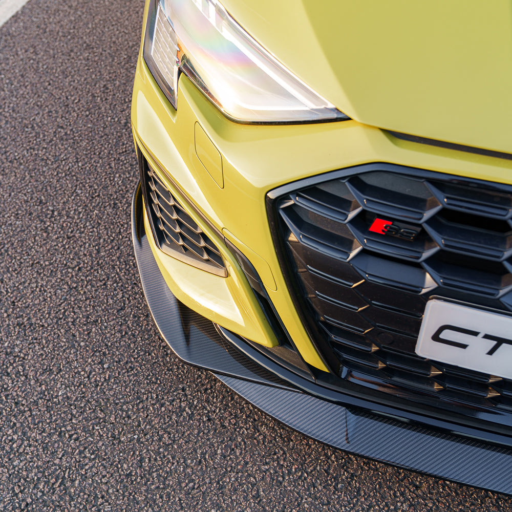 Yellow Audi S3 8Y carbon fibre splitter by CT Carbon, designed for AUDI A3 S-LINE & S3 2020+ models, showcasing its sleek aerodynamic design.