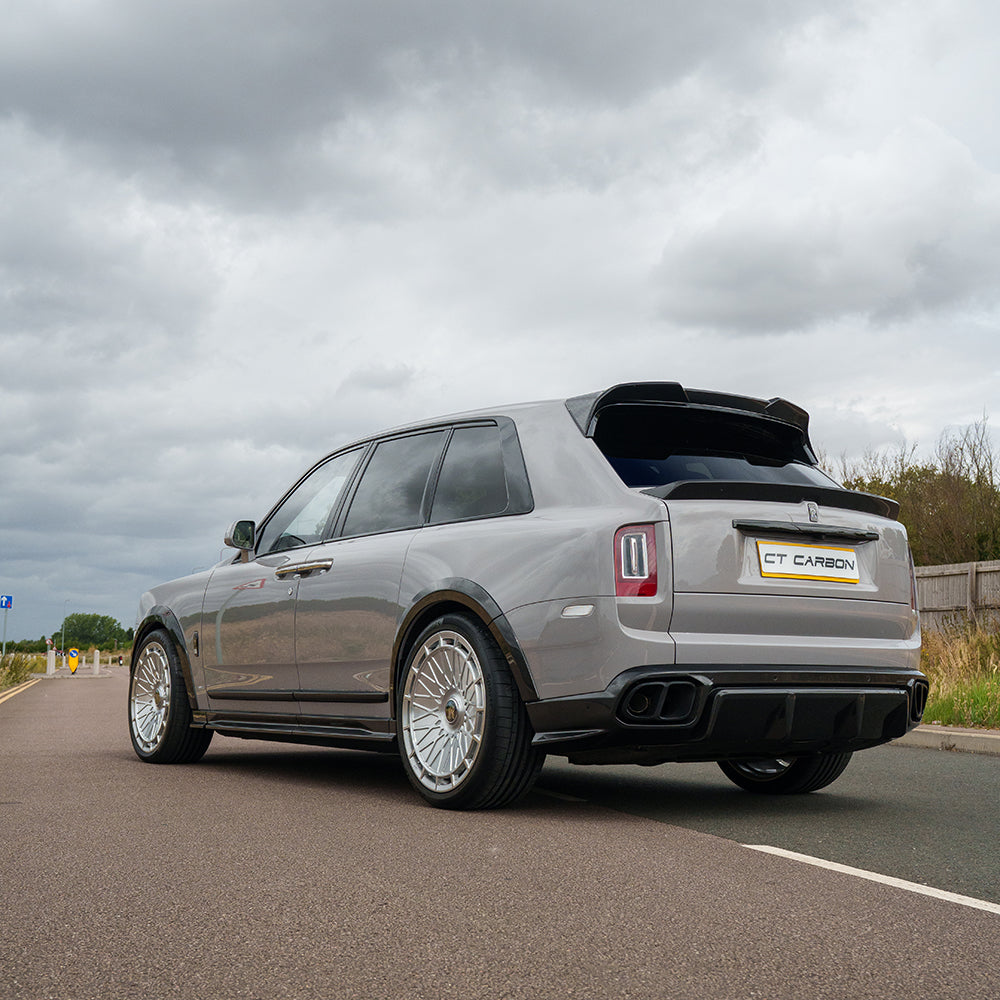 Rolls Royce Cullinan full carbon fibre kit with CT Design, featuring a sleek middle spoiler on a luxury SUV.