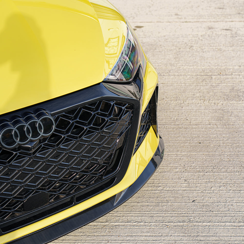 Carbon fiber splitter for Audi RS3 8Y 2025+ by CT Carbon, featuring V2 design, installed on the front bumper.