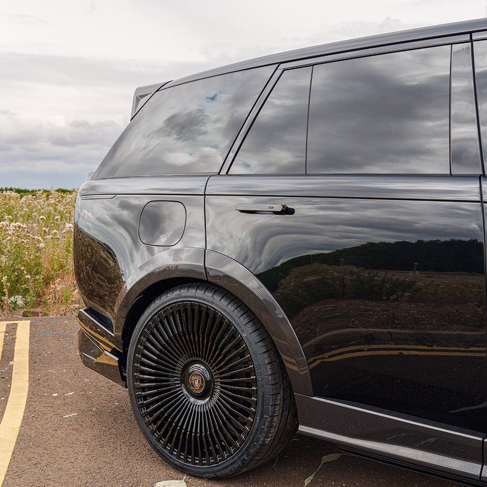 Range Rover L460 (SWB) 2022+ CT Carbon full carbon fiber kit, featuring sleek carbon fiber parts on a luxury SUV.