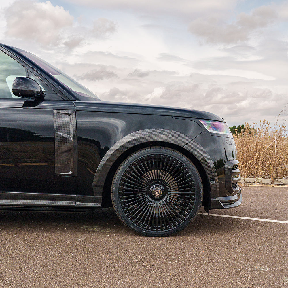 Range Rover L460 (SWB) 2022+ CT Design full carbon fibre kit, featuring sleek carbon fiber panels and accents.