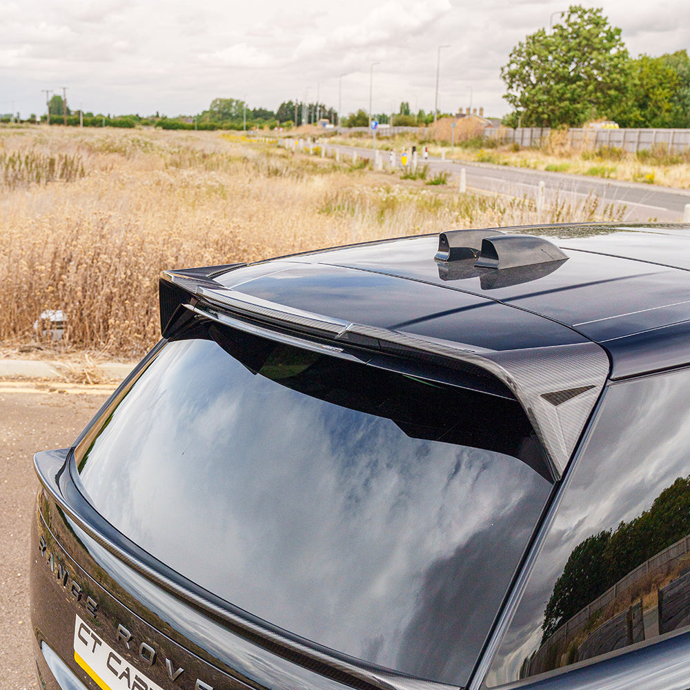 Range Rover L460 (SWB) 2022+ CT Carbon full carbon fibre kit, showing sleek, glossy carbon fiber panels on the vehicle.