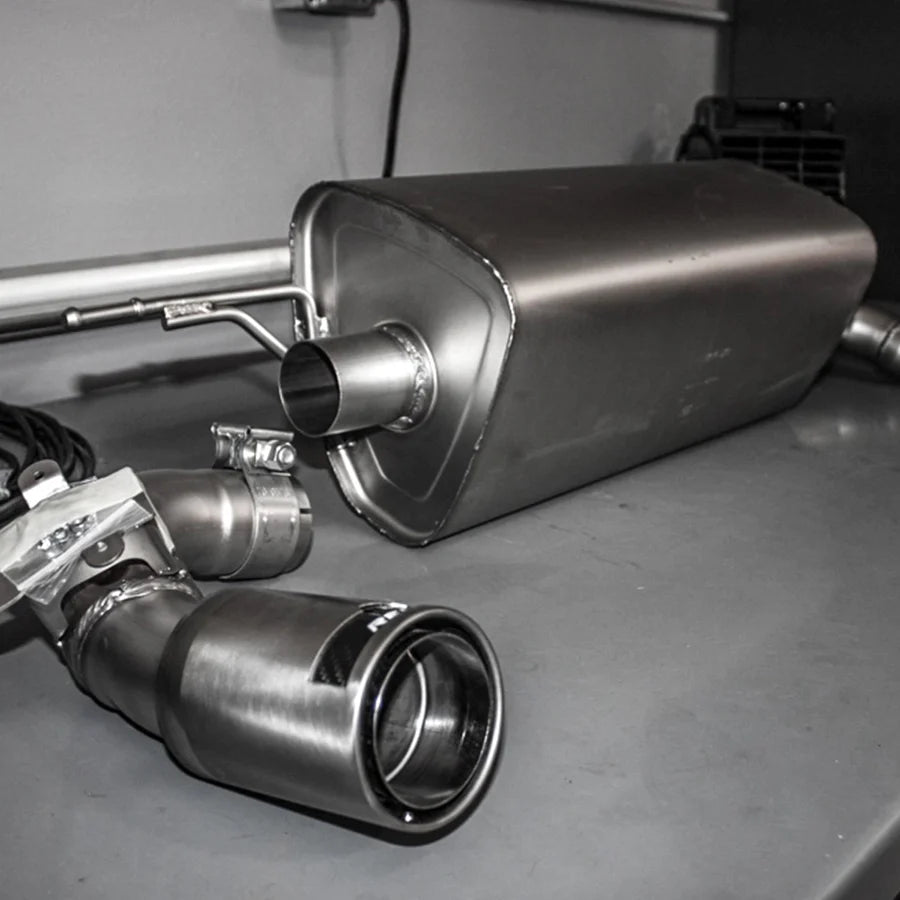 Remus axle-back exhaust system for BMW M135i and M235i N55 models, showing polished metal pipes and dual exhaust tips.