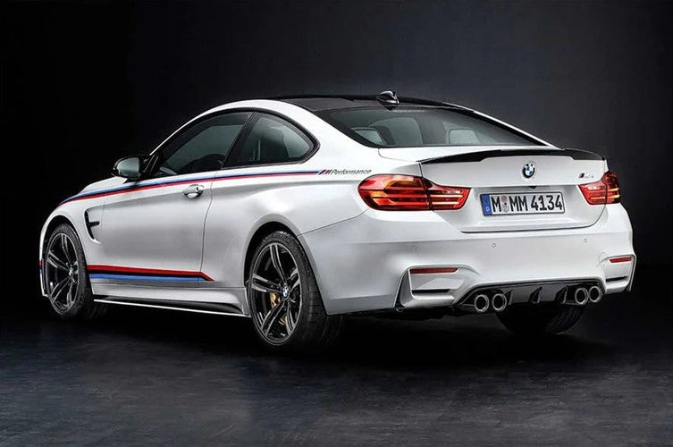 Genuine BMW F82/F83 M4 full carbon exterior trim kit, includes body panels and aerodynamic components for a sporty look.