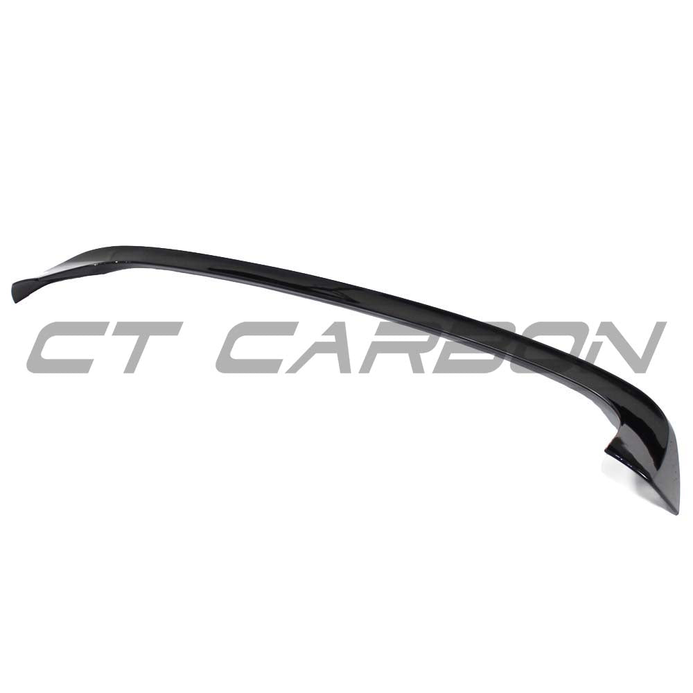 BMW F20/F21 1 Series LCI dual exit gloss black spoiler kit by CT Carbon, showing the sleek, aerodynamic design in high-quality finish.