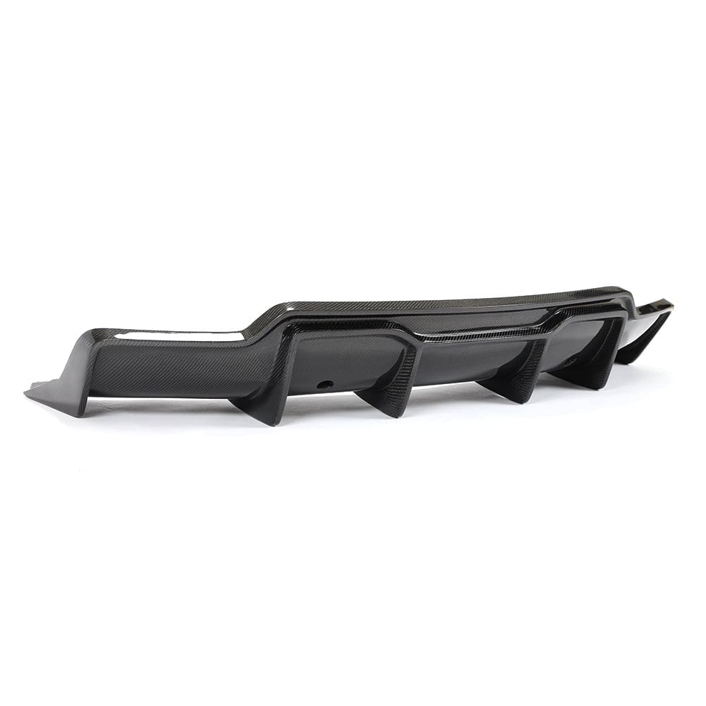 Tesla Model 3 2017-2023 carbon fiber diffuser by CT Carbon, close-up of sleek, lightweight automotive rear diffuser.