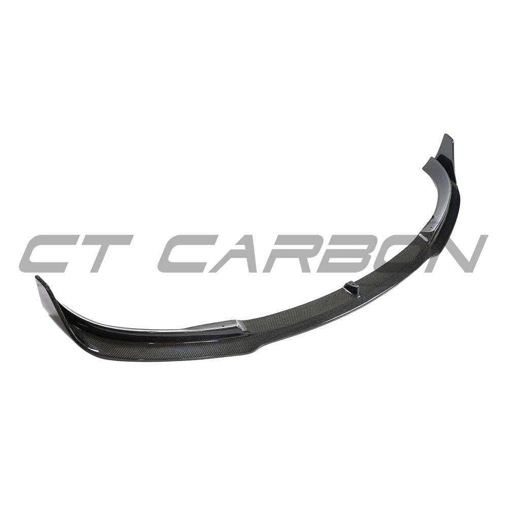 Tesla Model 3 2017-2023 CT Carbon V2 carbon fiber splitter installed on front bumper, showcasing sleek, lightweight aerodynamic design.