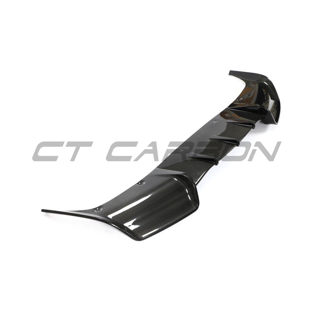 Tesla Model Y 2020-2025 CT Carbon full carbon fiber kit, includes panels and accessories, installed on vehicle with a sleek finish.