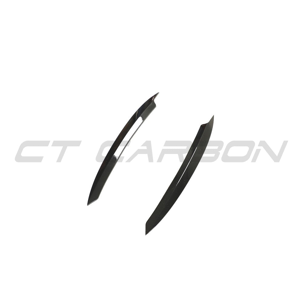 Gloss black headlight eyebrows for Volkswagen Golf MK7/7.5 by CT Carbon, enhancing the vehicle's front styling.