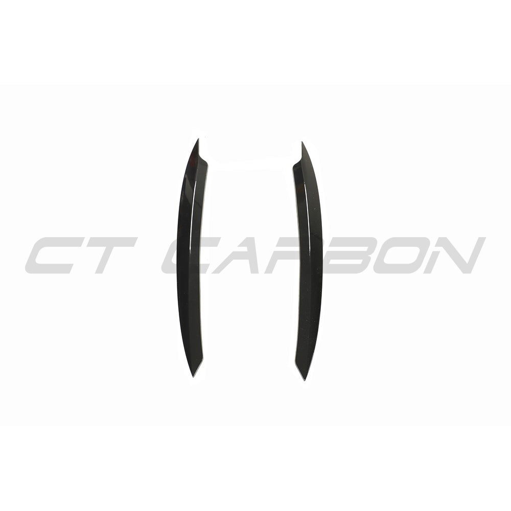 Gloss black headlight eyebrows for Volkswagen Golf MK7/7.5 by CT Carbon, accessory enhancing the vehicle's front appearance.