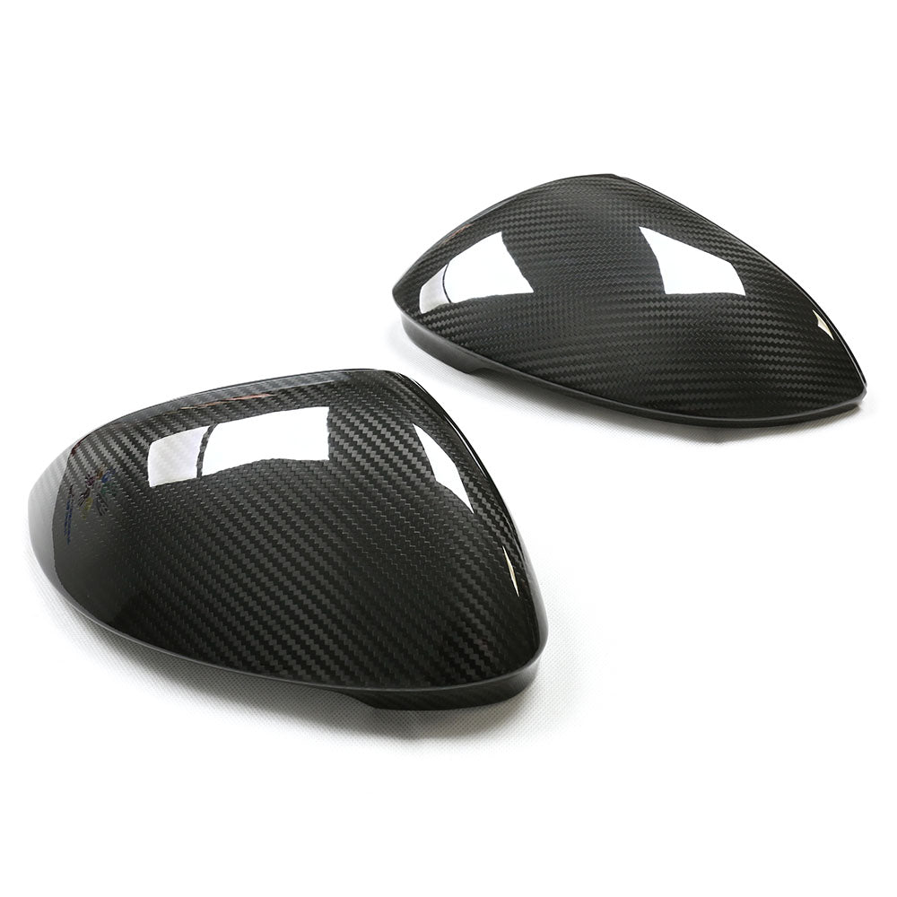 Volkswagen Golf MK8 carbon fibre mirrors with lane assist from CT Carbon, showcasing sleek design and advanced safety features.
