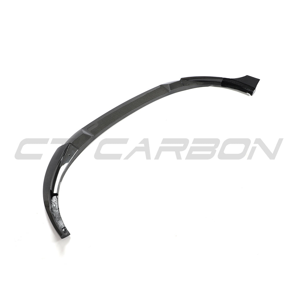 Carbon fiber front splitter for VW Golf MK8 GTI by CT Carbon, showcasing sleek aerodynamic design and high-quality material.
