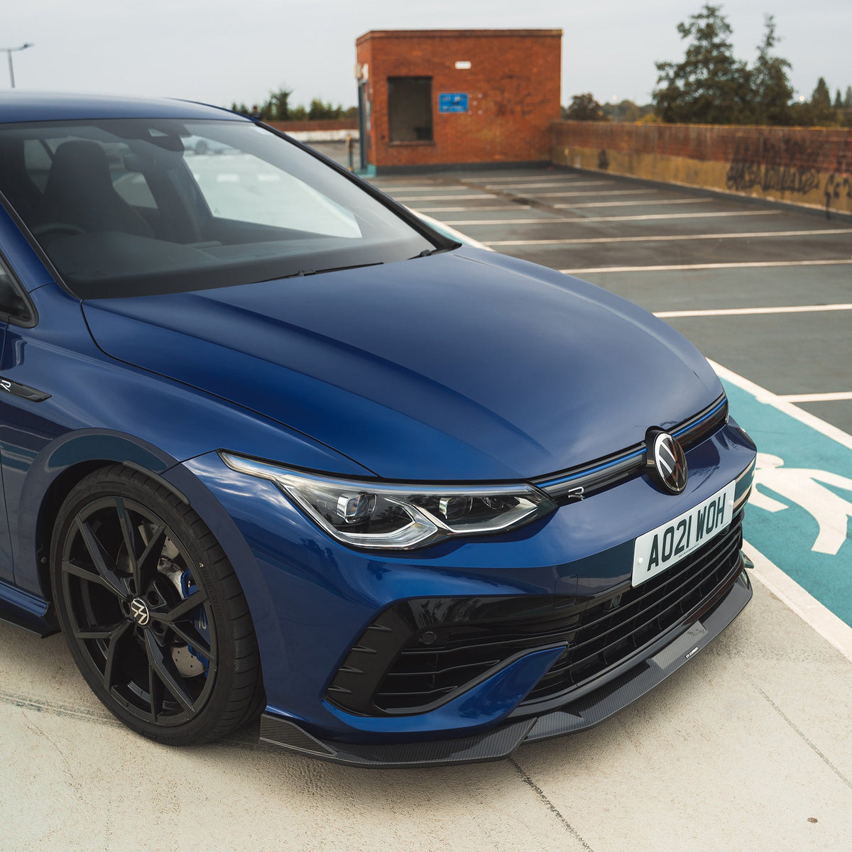 VW Golf MK8 R full carbon fiber kit by CT Design, showcasing sleek carbon fiber panels on the car's exterior.